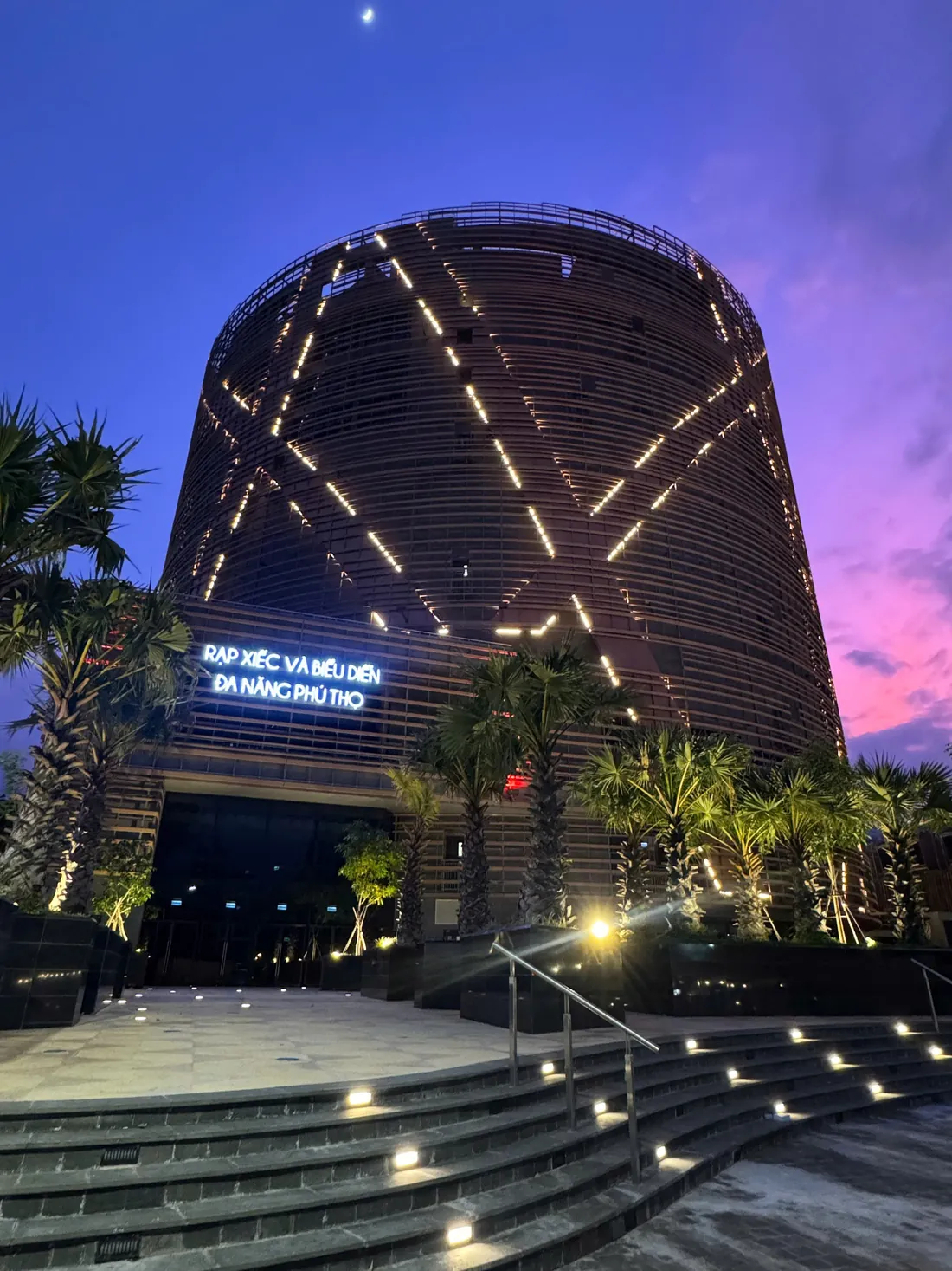 Phú Thọ Circus and Multi-Purpose Performance Hall, District 11 HCMC, façade lit at dusk